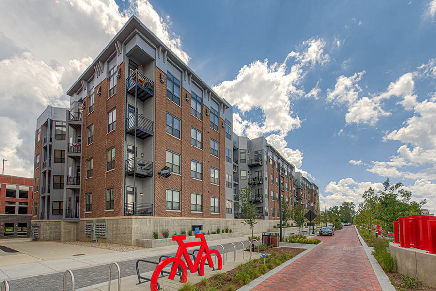 With several charging stations nearby, Midtown Flats Apartments in Carmel is an excellent choice for EV drivers. Apartment building in Carmel next to Monon Trail
